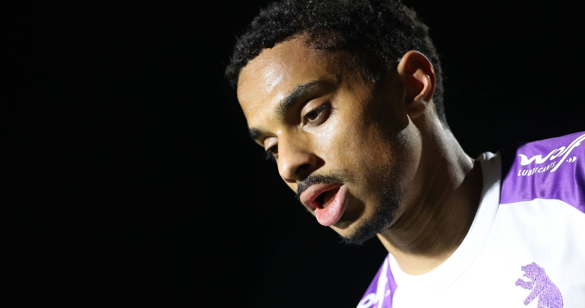 Player looking down during post-match interview