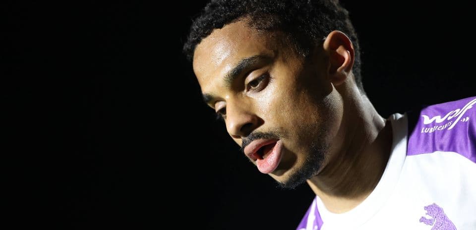 Player looking down during post-match interview