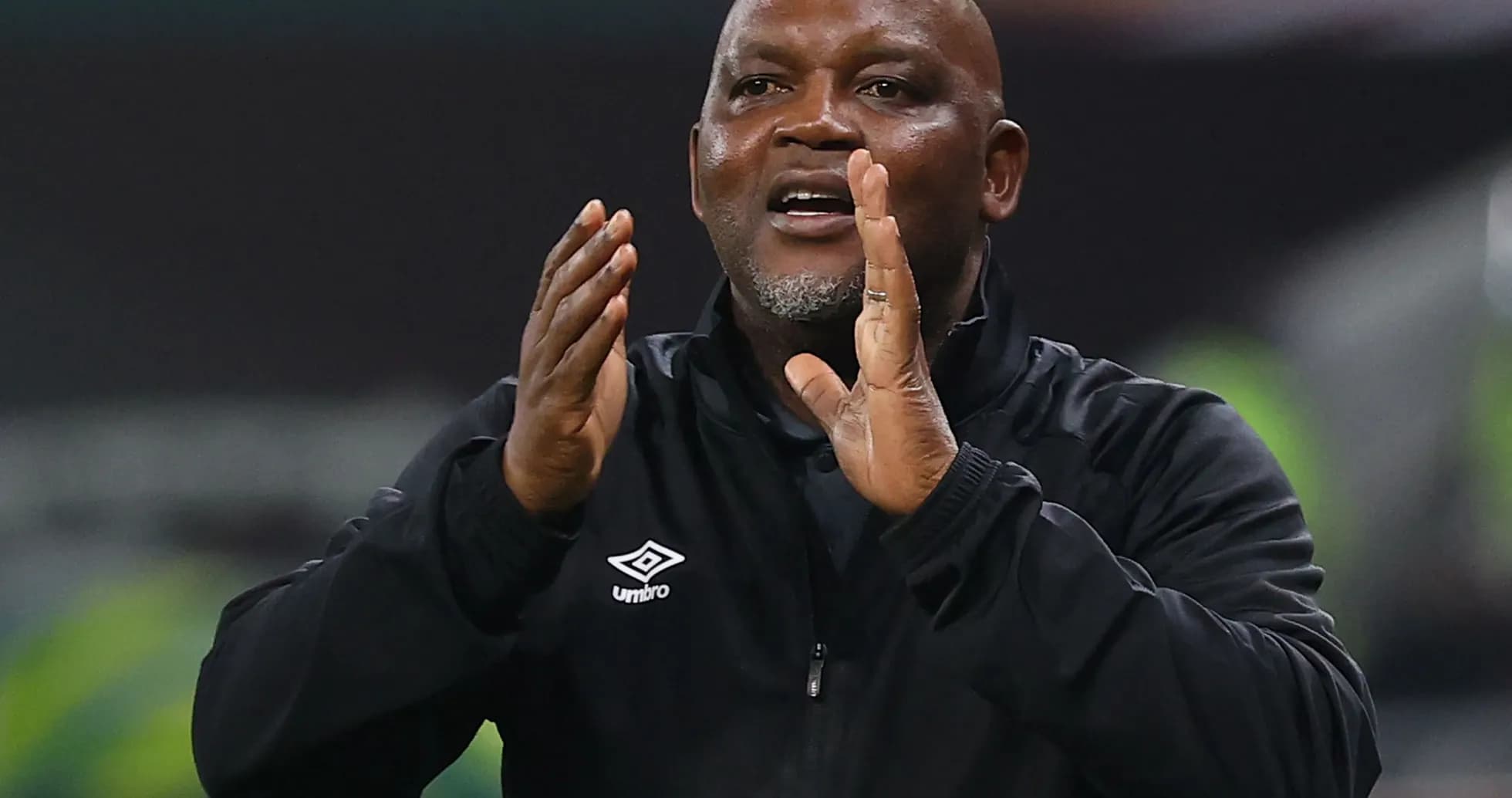 Coach giving instructions during a match