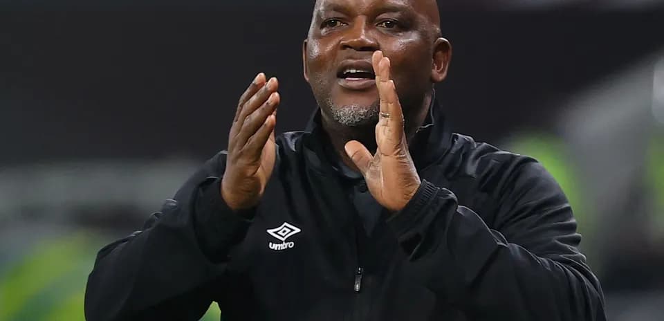 Coach giving instructions during a match
