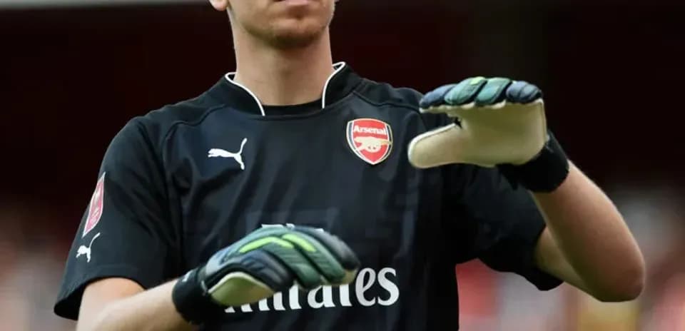 Goalkeeper warming up before match at stadium