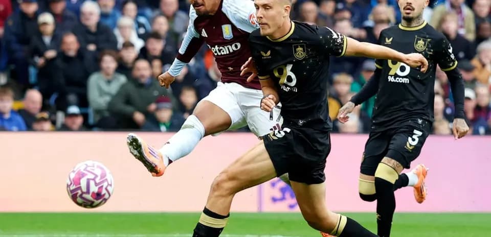 Player striking the ball during Burnley vs Aston Villa