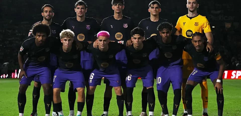 Football team posing for a group photo before match