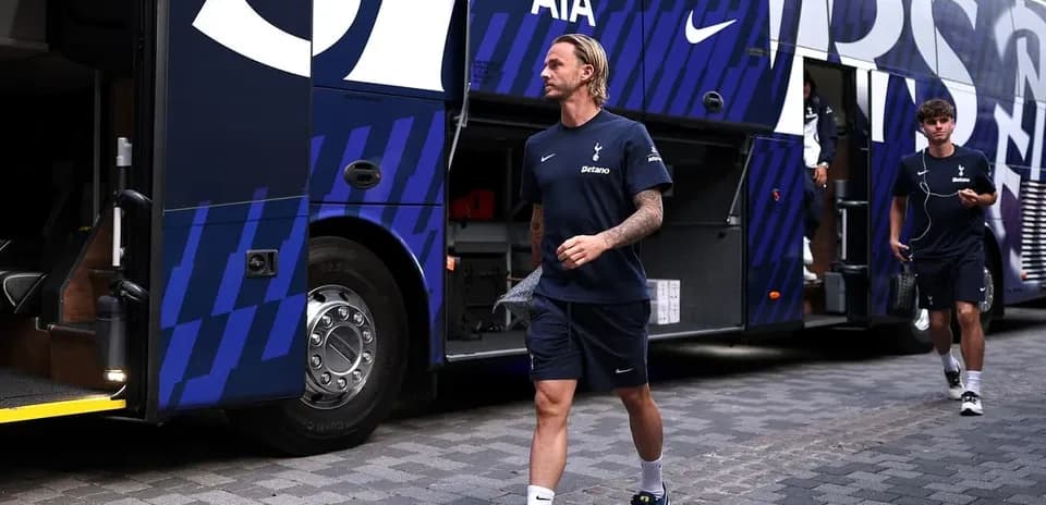 Tottenham players exiting team bus before match