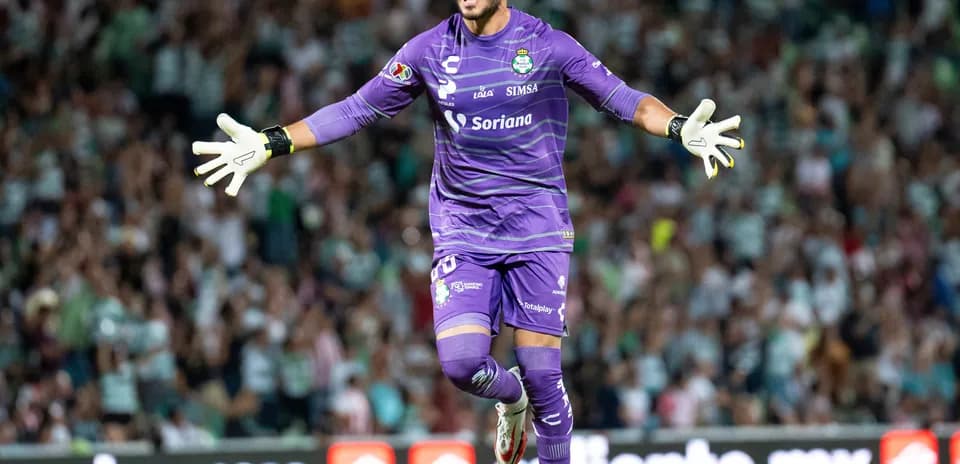 Goalkeeper celebrating during Liga MX match