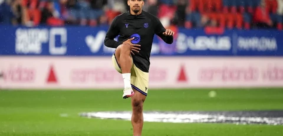 Player warming up on the field before match