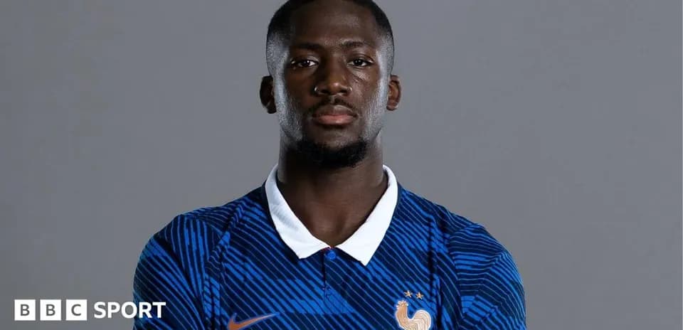 Player posing in France national team jersey