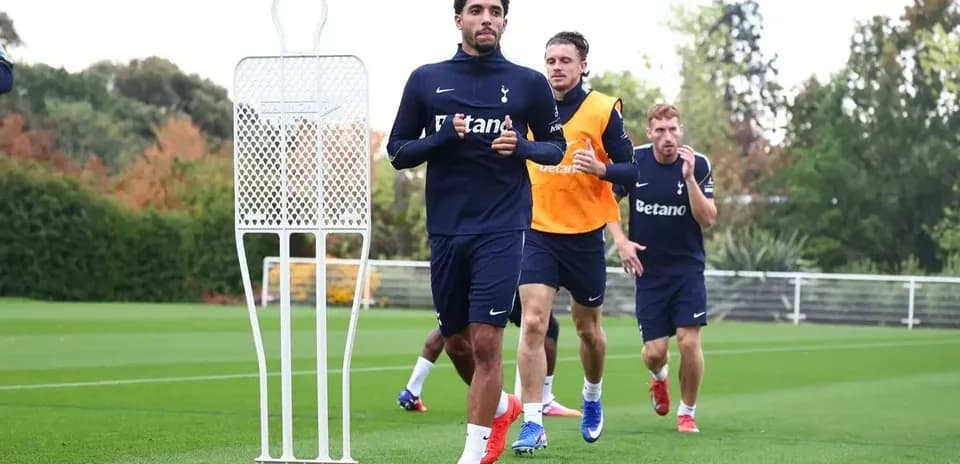 Players running during training session at Tottenham facility