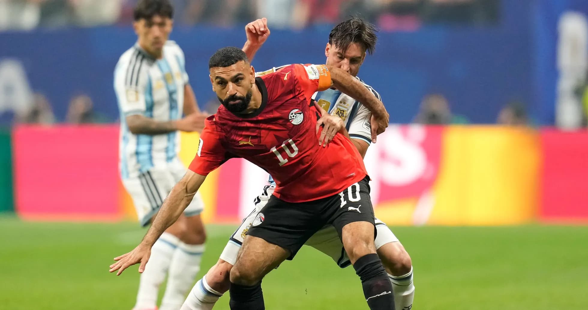 Egyptian player challenged by Argentine player during match