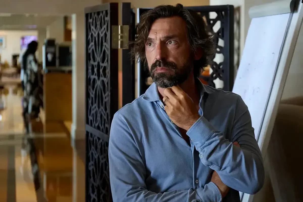 Man in a blue shirt thinking in an office