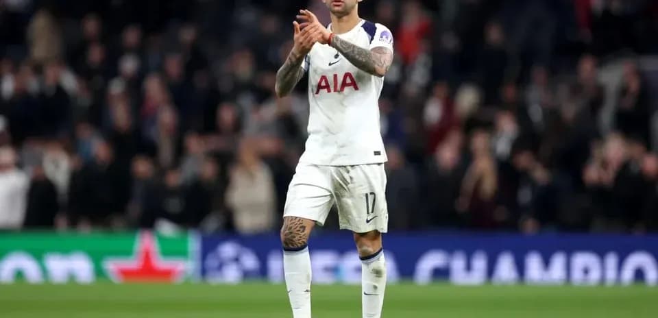 Player applauding fans after match at stadium