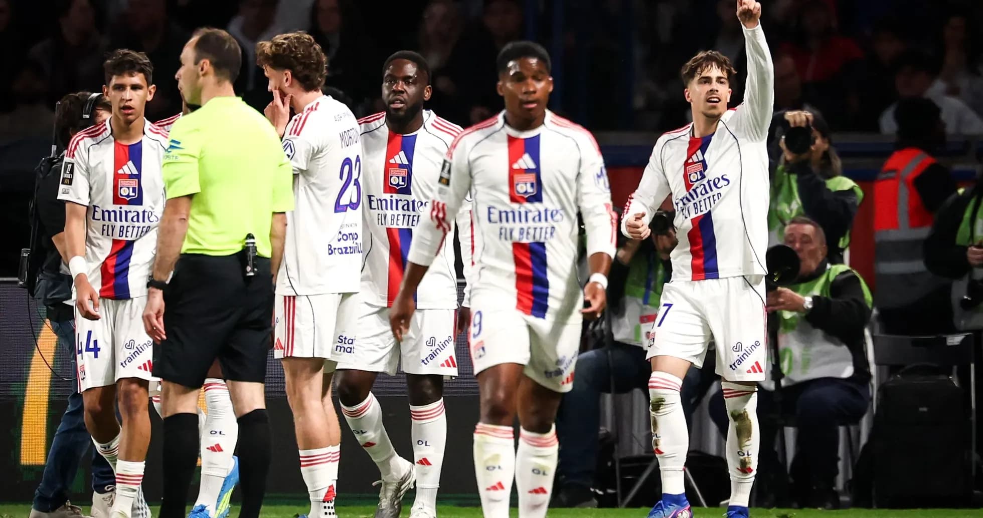 Lyon players celebrating a goal during match