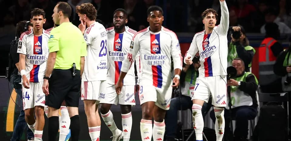 Lyon players celebrating a goal during match