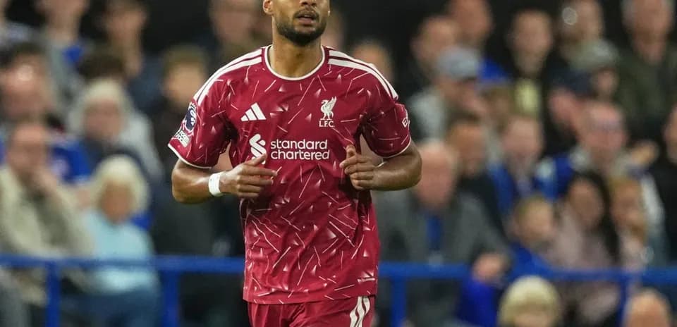 Liverpool player running on the pitch during match