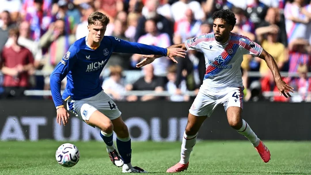 Two players competing for the ball during match