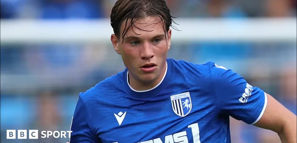 Gillingham player running during a match