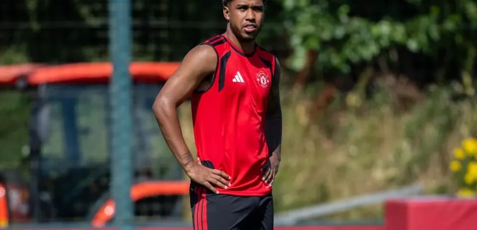 Player training in red kit during practice session