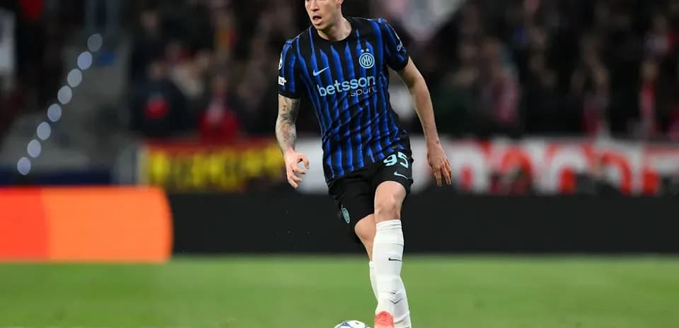 Player dribbling ball during a football match