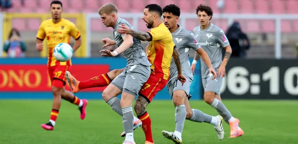 Players competing for the ball during Serie A match