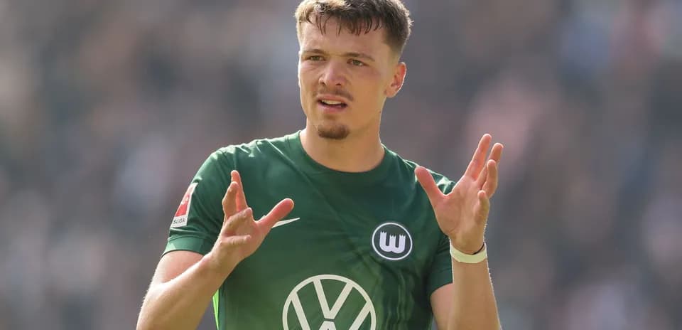 Player gesturing during Bundesliga match action