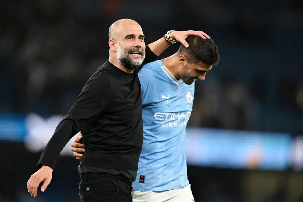 Coach and player celebrating after a match