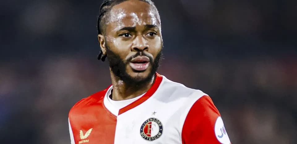 Player wearing Feyenoord jersey during match action