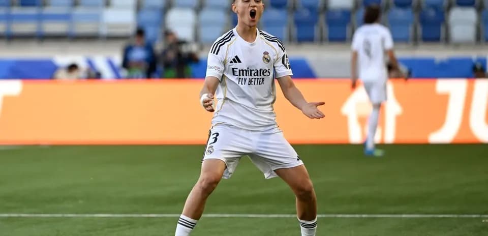 Player celebrating after scoring a goal for Real Madrid