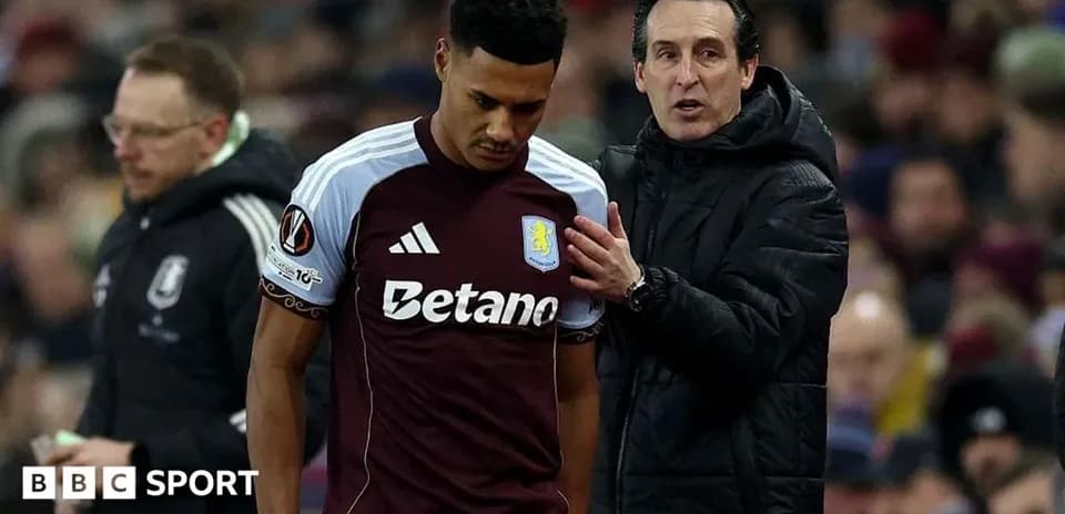 Coach speaking to player during match substitution