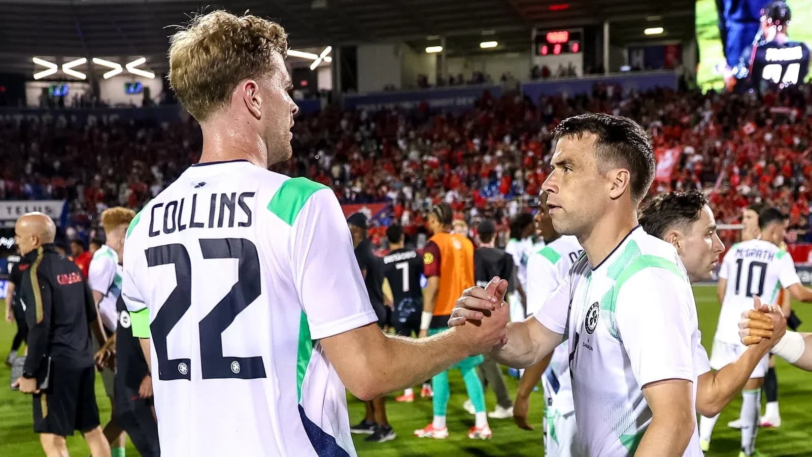 Players shaking hands after a soccer match