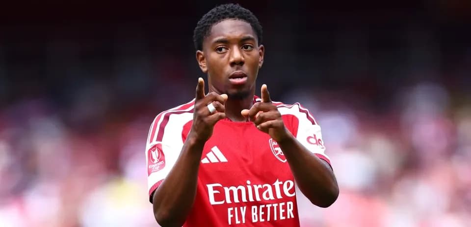 Player gesturing on the pitch during match