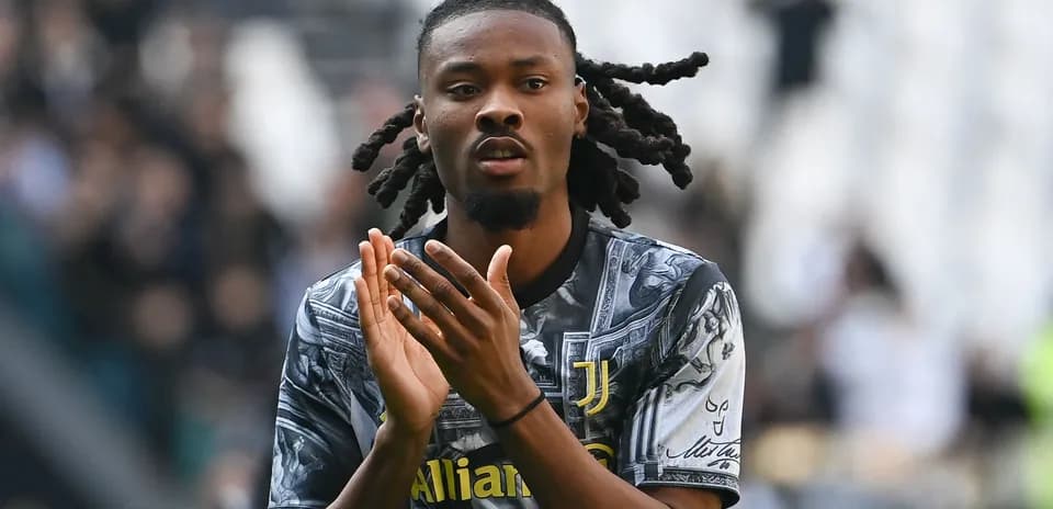 Player applauding fans wearing Juventus jersey