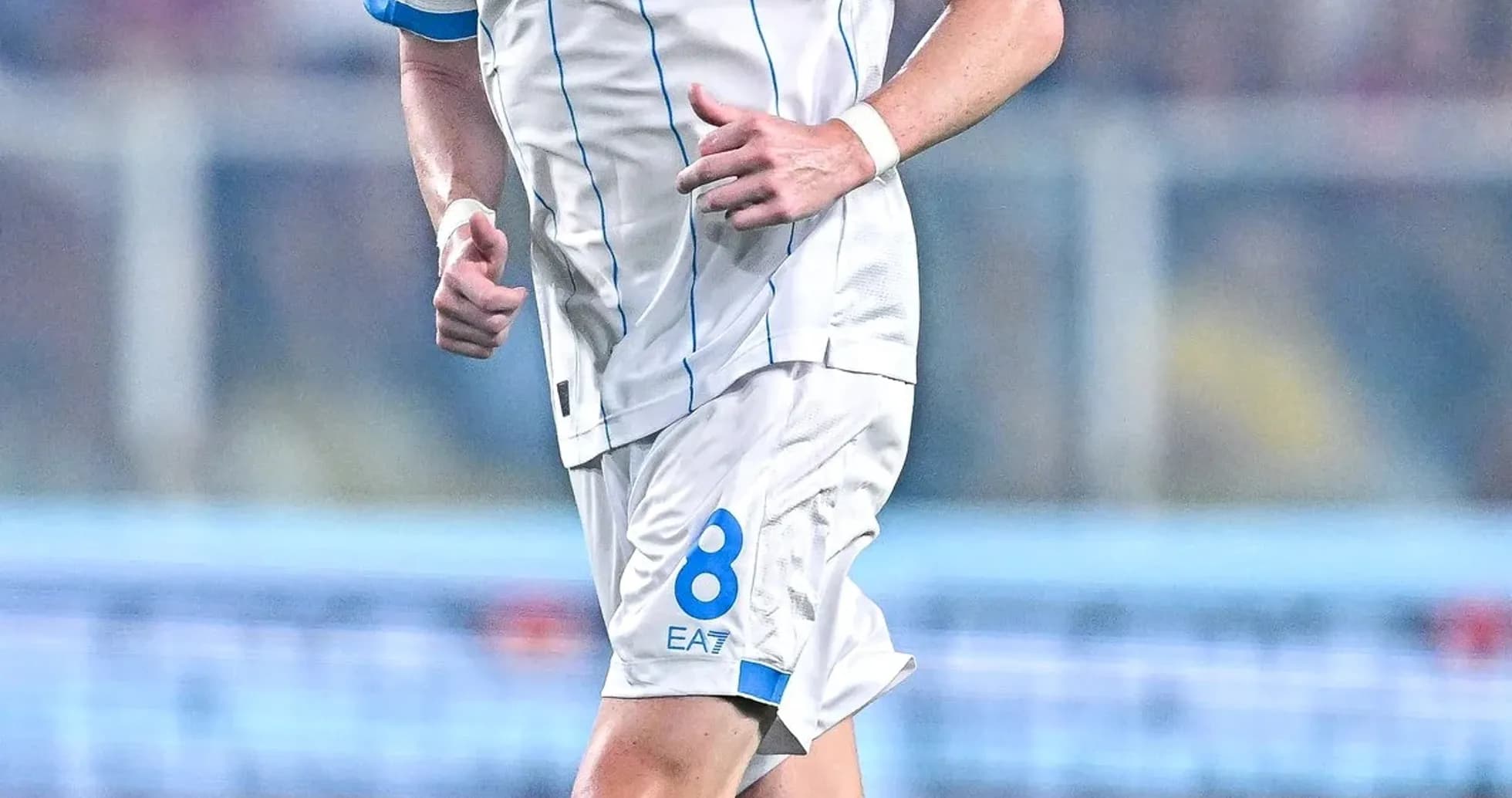 Player wearing Napoli kit running on the field
