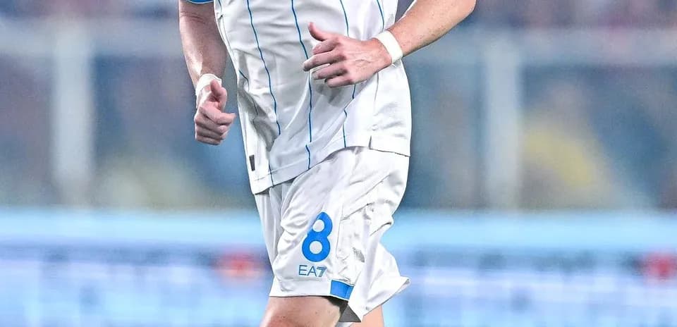 Player wearing Napoli kit running on the field