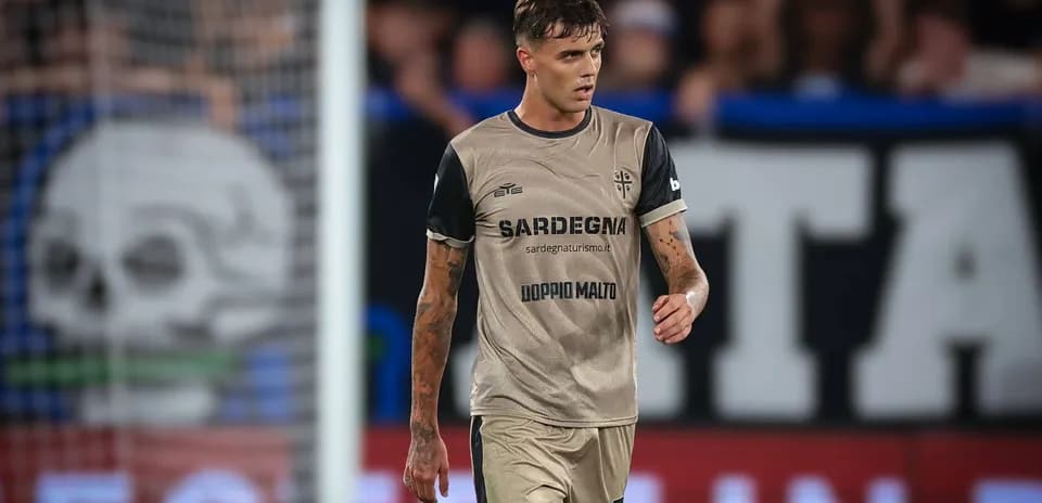 Player walking on the pitch in match attire