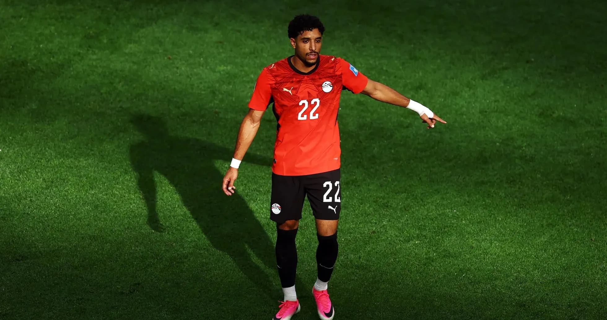 Egyptian player gesturing during football match