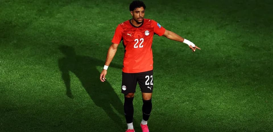 Egyptian player gesturing during football match