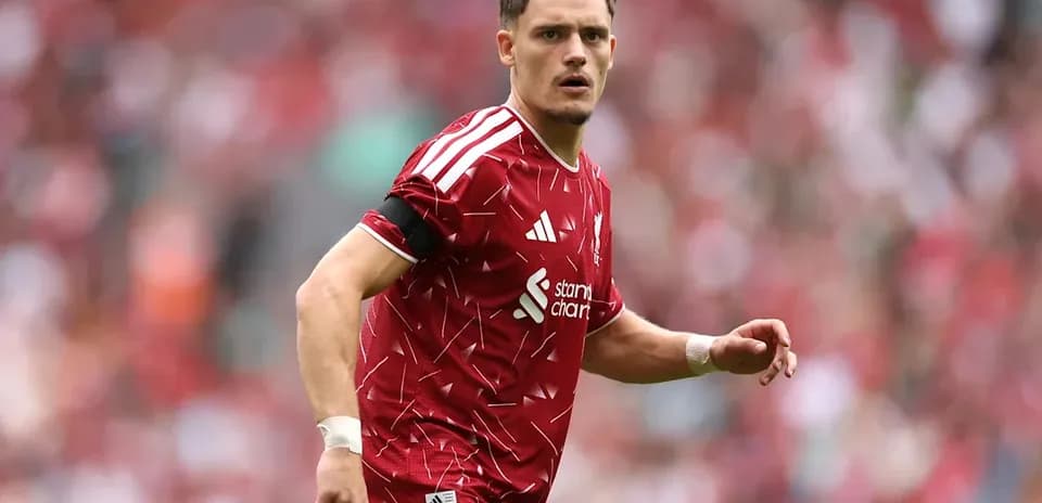 Player in red jersey during football match