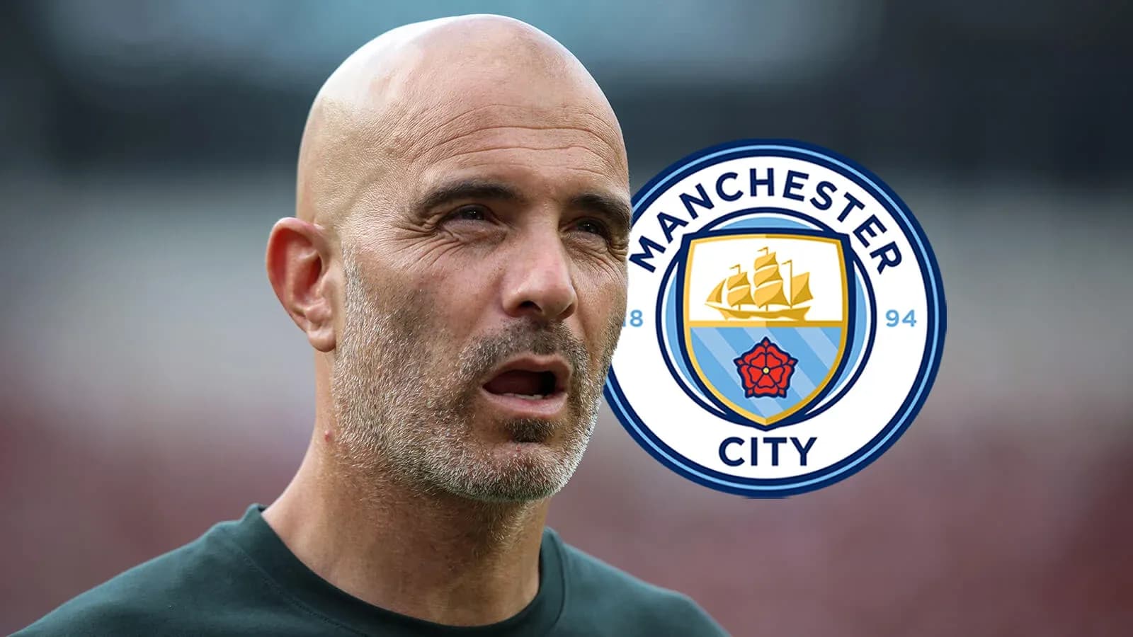 Coach with Manchester City logo in background