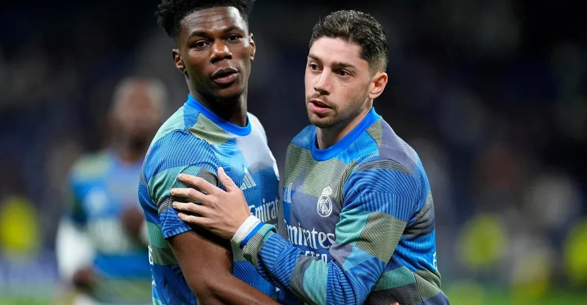 Two Real Madrid players interacting during warm-up