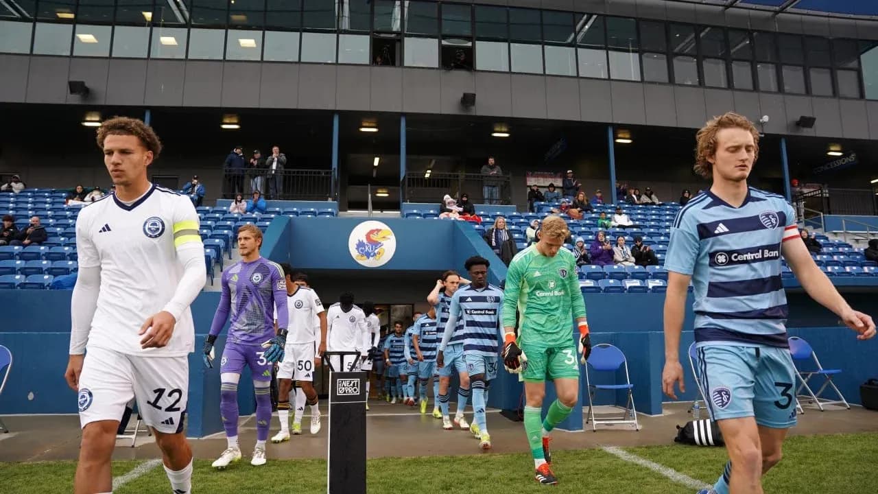 Players walking onto the field for match