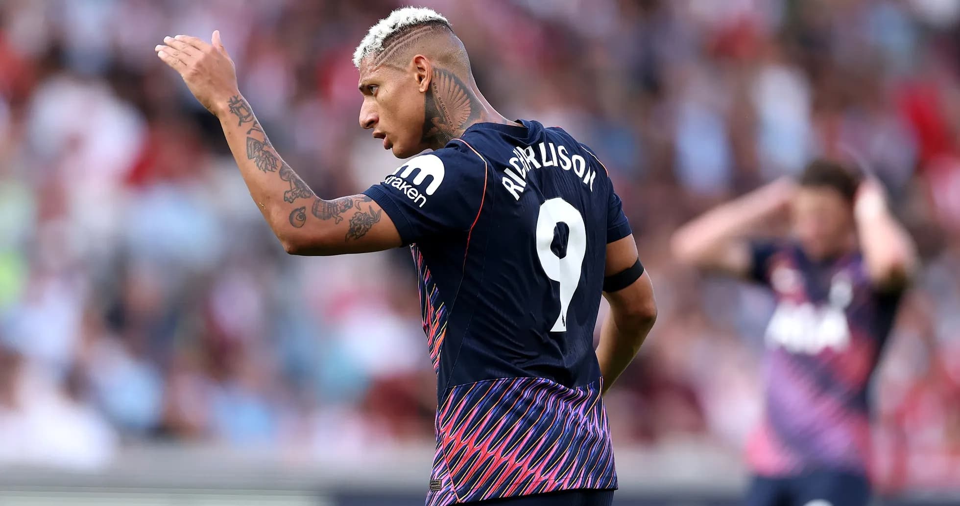 Richarlison gesturing during a football match