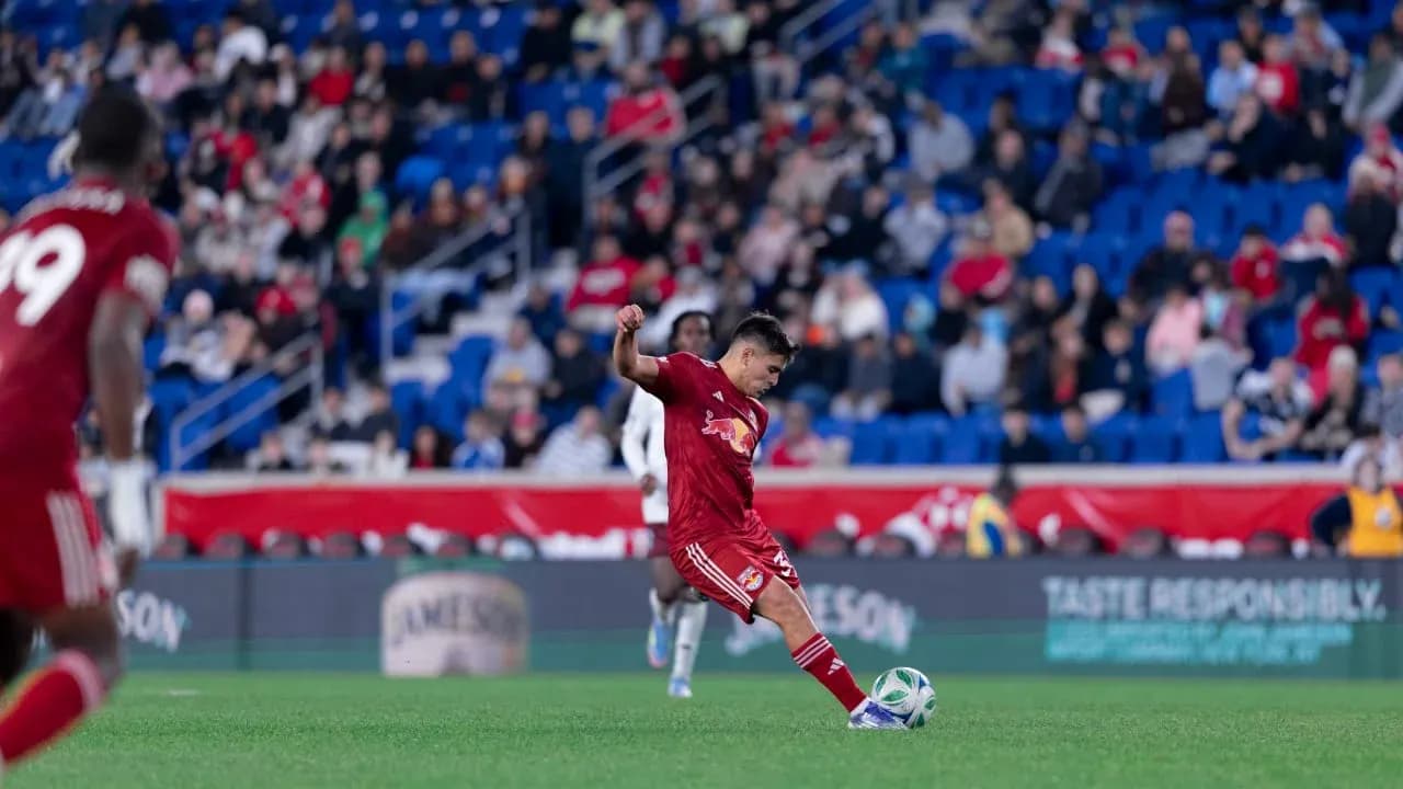 New York RB II player kicking the ball