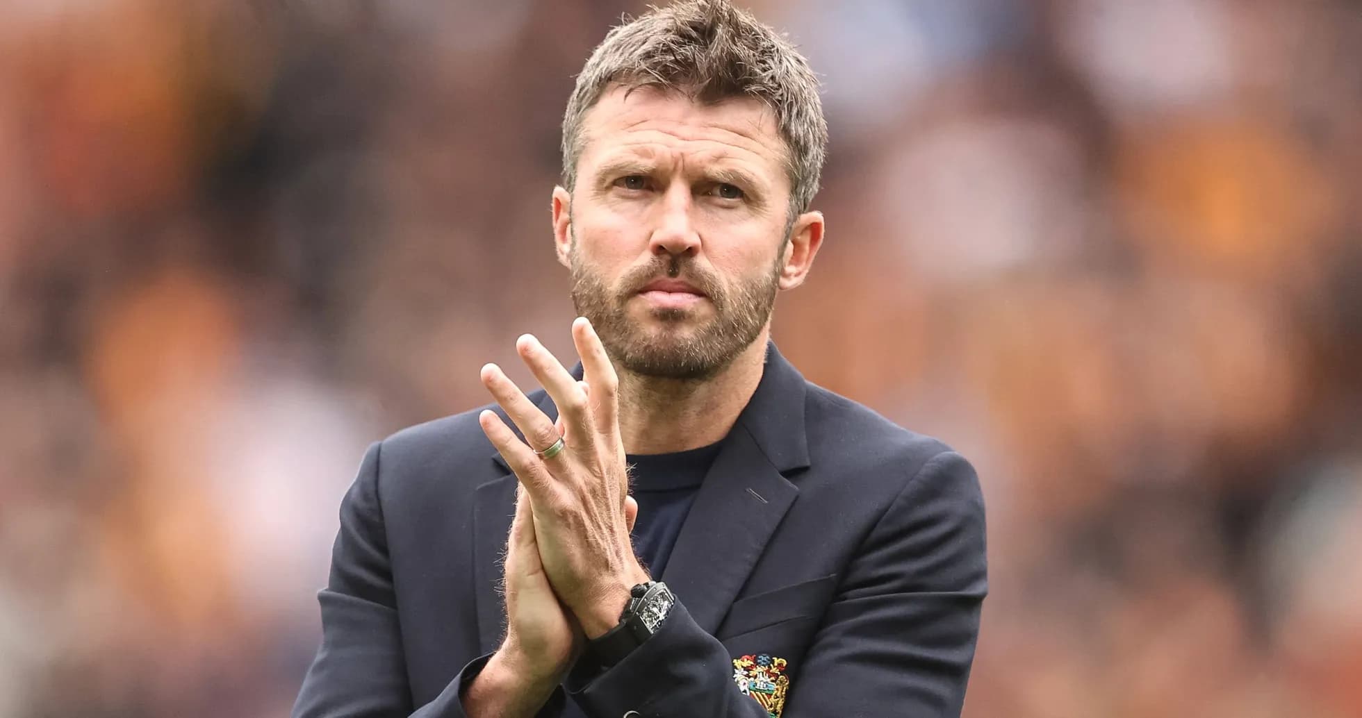 Coach gesturing during match on the sidelines