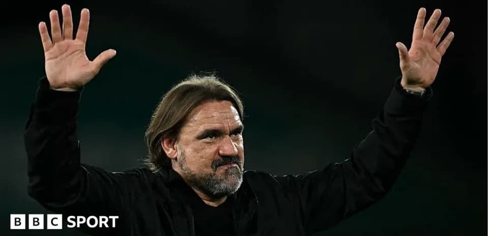 Coach gesturing during a match celebration