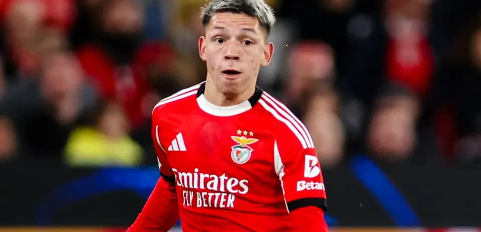 Benfica player running during match celebration