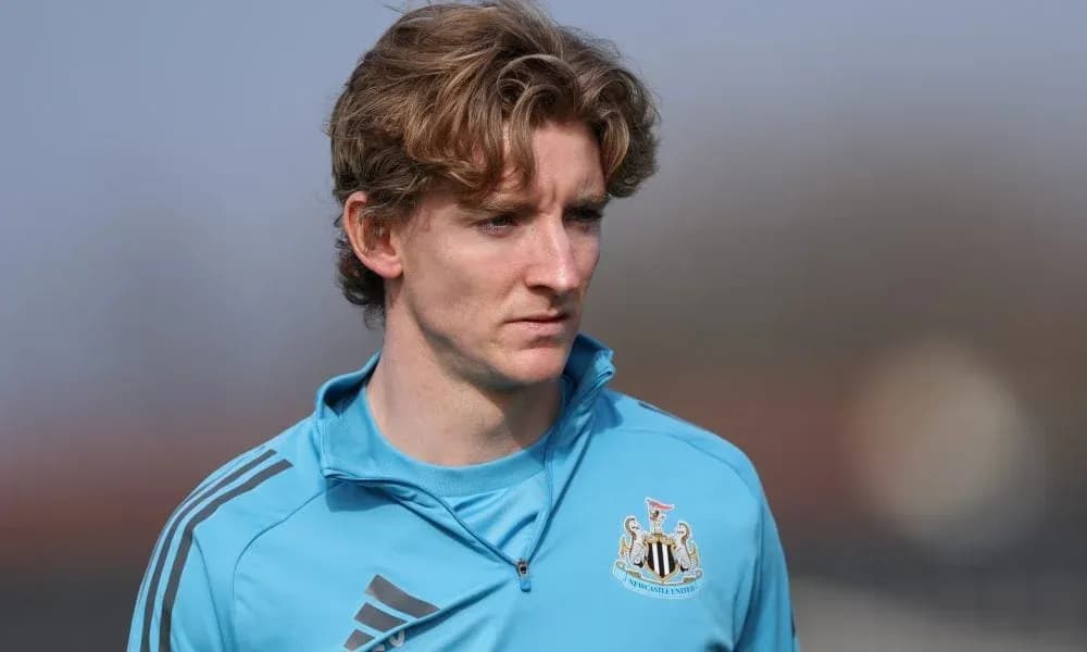Player in Newcastle United training kit outdoors