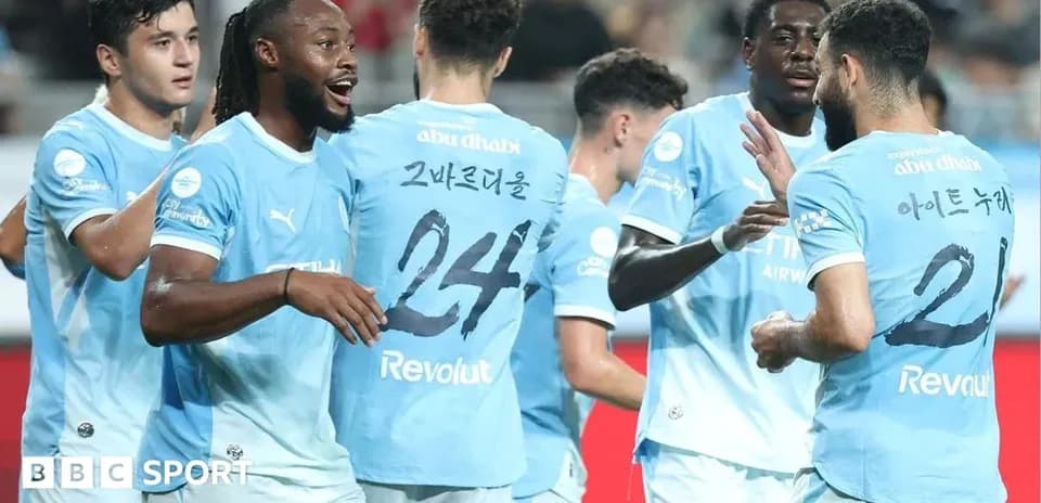 Players celebrating a goal during a match