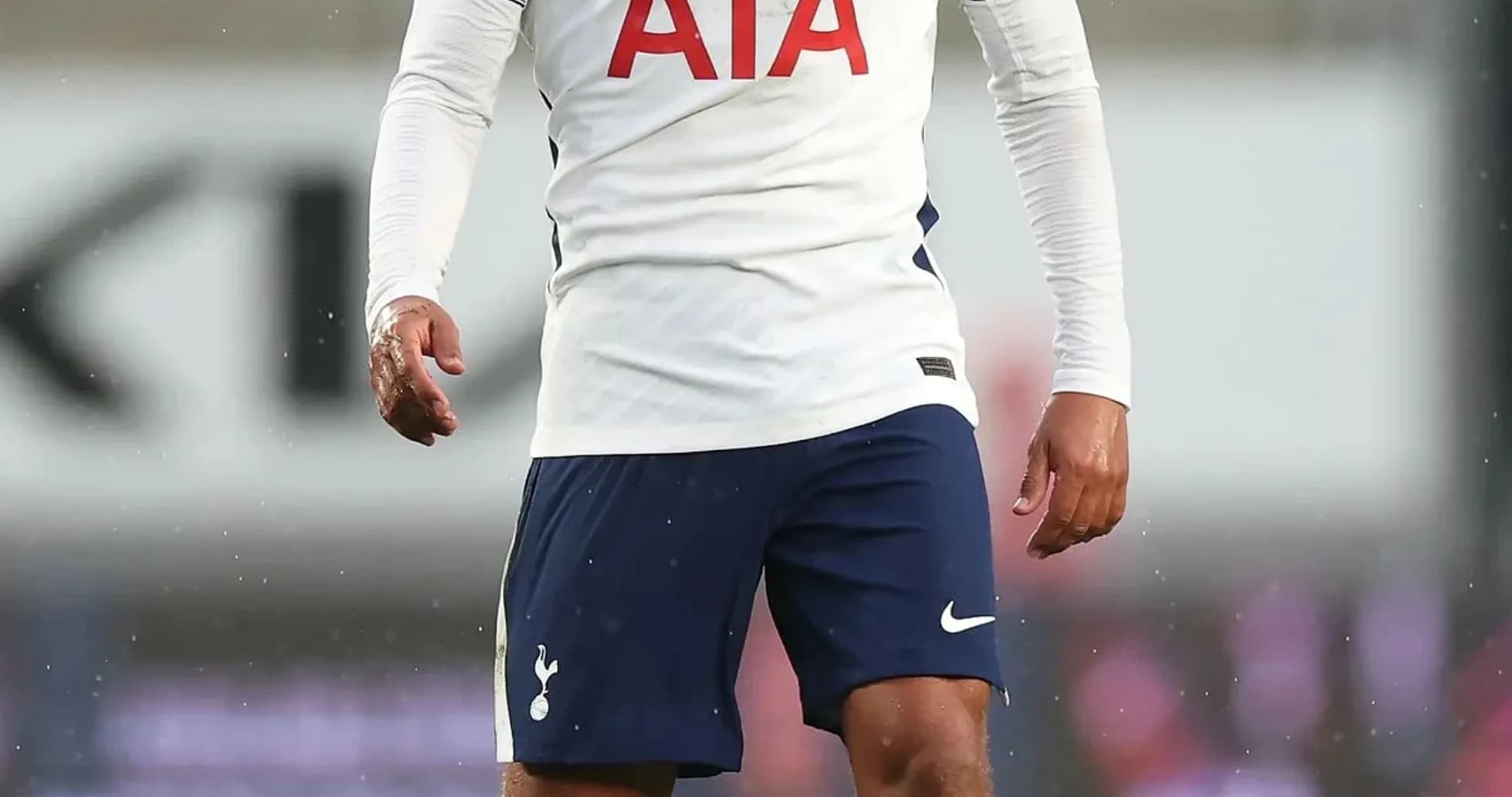 Player in Tottenham kit on the field