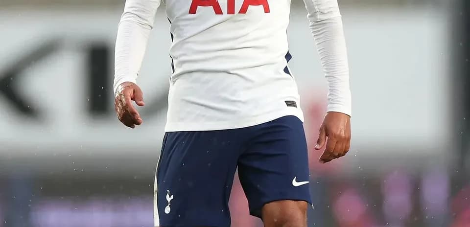 Player in Tottenham kit on the field