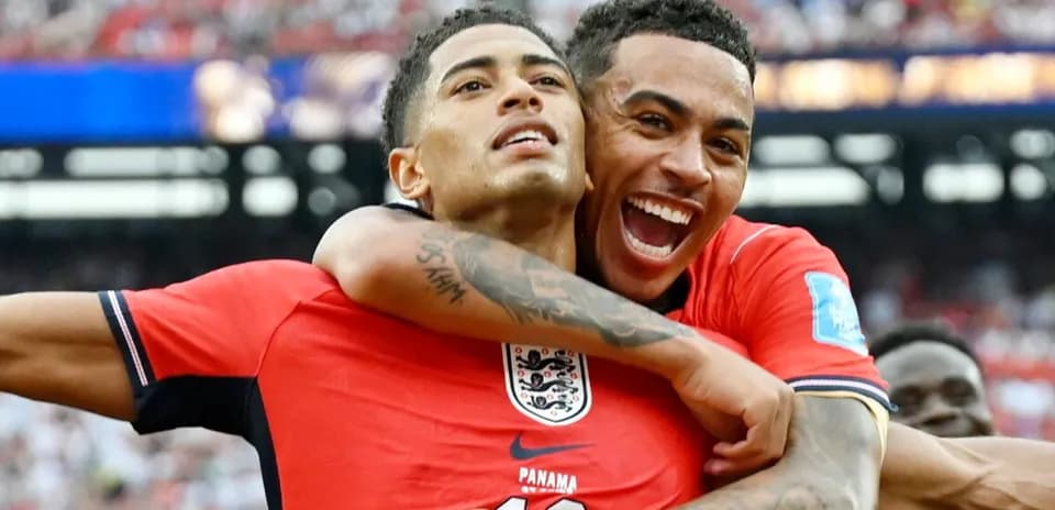 Two players celebrating together during a match